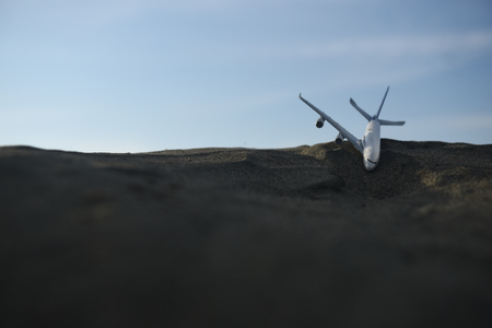 Airplane doing emergency landing in desertの写真素材