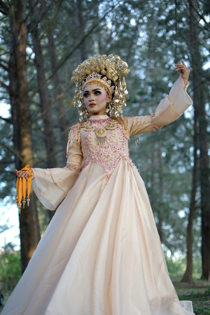 Beautiful bride in Indonesian traditional wedding dressの写真素材