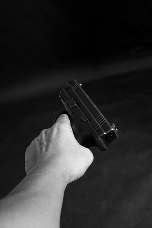 Man holding a Pistol/Gun