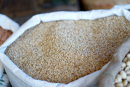 Sack of Coriander seeds for sale at traditional vegetable marketの写真素材