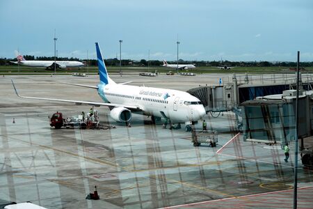 Jakarta, Indonesia - âFebruary â3, â2017: Garuda Indonesia airplane prepare for passenger boarding the aircraft at Soekarnoa ÂÂHatta International Airport in Tangerang. Garuda Indonesia is the flag carrier of Indonesia.のeditorial素材