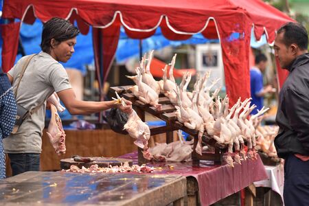 Banda Aceh, Indonesia â July 7, 2015: Market Vendor sale Raw chicken at Traditional street market in Banda Aceh Capital City, Aceh Provinceのeditorial素材