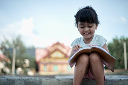 Asian little girl study from home during a virus  outbreakの写真素材