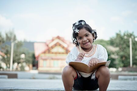 Asian little girl study from home during a virus  outbreakの写真素材