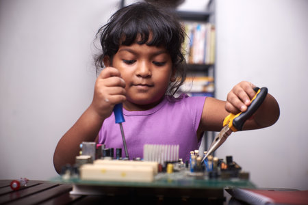 Little girl playing with Motherboard Computer at home, Education Technology and science conceptの写真素材