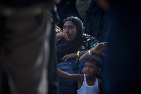Banda Aceh, Indonesia - 11 December 2023:Rohingya refugees from Myanmar stranded on aceh coast,...