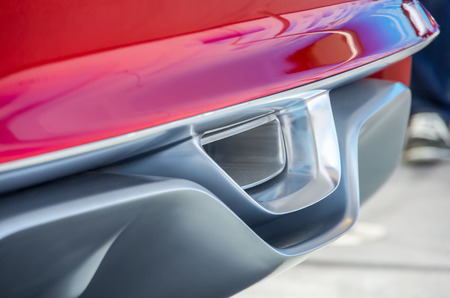 GENEVA, SWITZERLAND - MARCH 12: The Ford Evos coupe concept exhaust closeup on display at 82nd Geneva International Motor Show (Salon international) Geneva-Palexpo on March 12, 2012 in Geneva, Switzerlandのeditorial素材