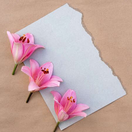 card with a bouquet of pink lilies with copy space for design