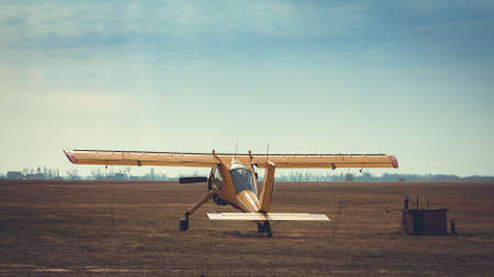 old vintage small plane at the airfield outdoorsの写真素材