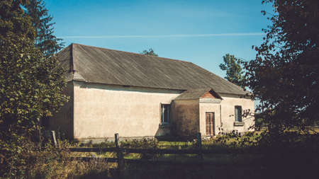 Old abandoned ruined wooden house in the countrysideの写真素材