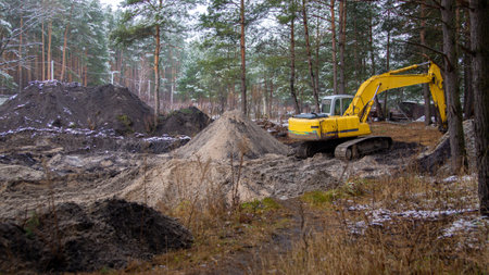 Excavator working on a construction site in the countryside