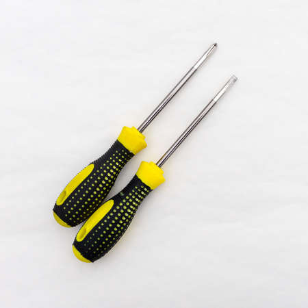 Tool for tightening screws and self-tapping screws. Screwdrivers with black and yellow handle.の写真素材