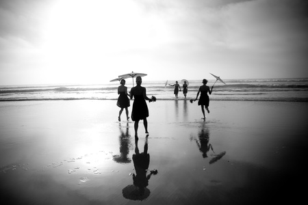 Women on the beach in dressesの写真素材