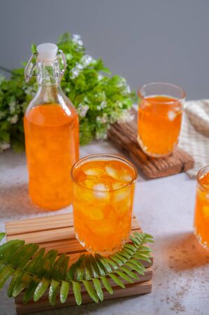 Orange juice on a wooden. Beverage fruitの写真素材