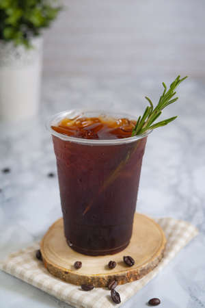 Americano coffee with iced in glass plasticの写真素材
