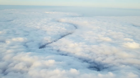 Clouds river diving effect in the blue sky upper view.の素材