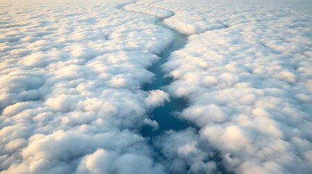 Beautiful aerial view above the clouds. View from airplane window.の素材