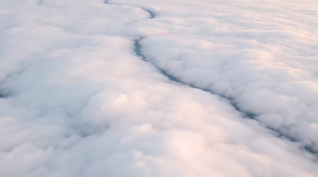 Clouds as seen through window of an aircraft flying above the earthの素材