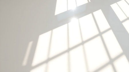 Sunlight through the window on white wall. 3D rendering.の素材