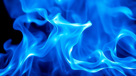 blue fire flames close up on black background. abstract background texture.の素材