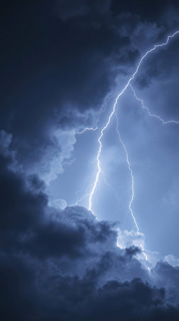 Lightning in the dark sky with deep clouds.の素材