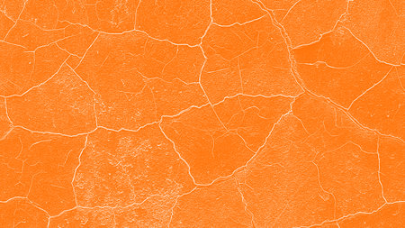 Cracked orange wall texture. Abstract background and texture for design.の写真素材