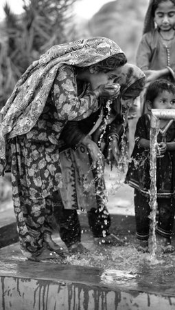 Children Drinking Water From handpump In sindh, Pakistanのeditorial素材