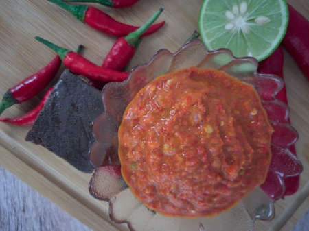 Shrimp paste sambal or better known as sambal belacan. a famous traditional dips in Malaysia. Selective focus points. Blurred backgroundの写真素材