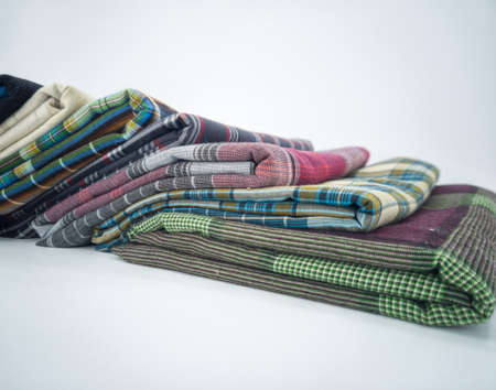 Sarongs or locally known as kain pelikat, worn by most Asian men. Selective focus points