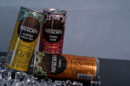 Kuala Lumpur, Malaysia: June 4, 2021 - New variants of can soft drinks from the brand Nescafe. Selective focus points. Blurred backgroundのeditorial素材