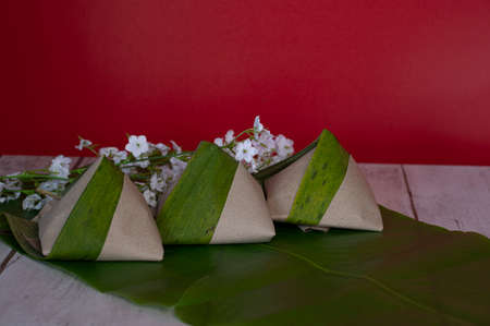 A portion of Nasi Lemak, rice cooked with coconut milk, a popular local dish in Malaysia. Selective focus points. Blurred backgroundの写真素材
