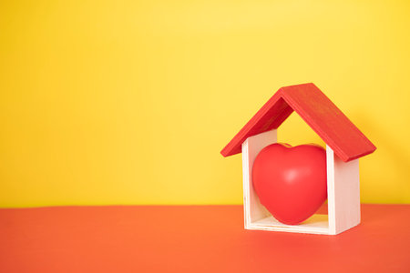 Layout depicting the proverb Home is where the heart is. Selective focus points. Blurred backgroundの写真素材