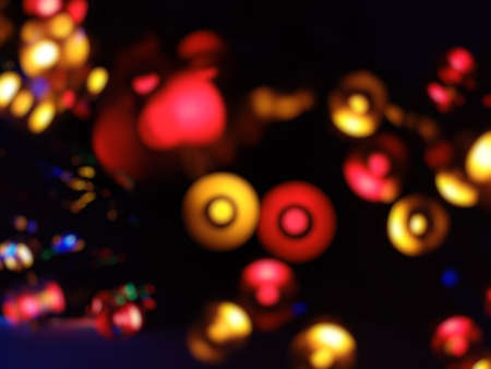 Blinking neon lights with blurry effect. Dark background and selective focus points