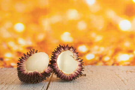 Local fruits called pulasan that has been opened. Pulasan is a tropical fruit from soapberry family,...