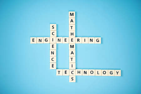 Crossword puzzles showing STEM, acronym for Science, Engineering, Technology, Mathematics. Education conceptの写真素材