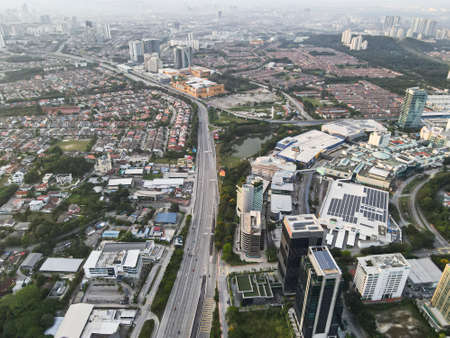 Kuala Lumpur, Malaysia: Oct 10, 2021 - Aerial view of a commercial and residential area in the...