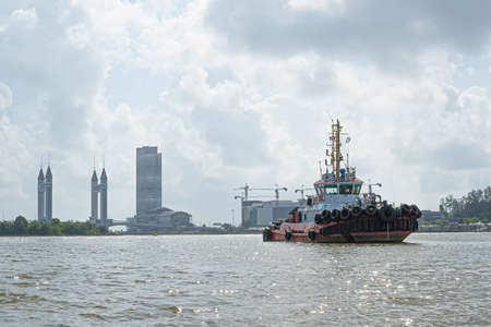 Terengganu, Malaysia: Jan 16, 2022 - Large boat moving along the river in the east coast state of...