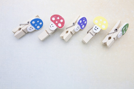 Colorful wood clips on the tableの写真素材