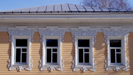 A wooden house in a small town with a russian threadの写真素材