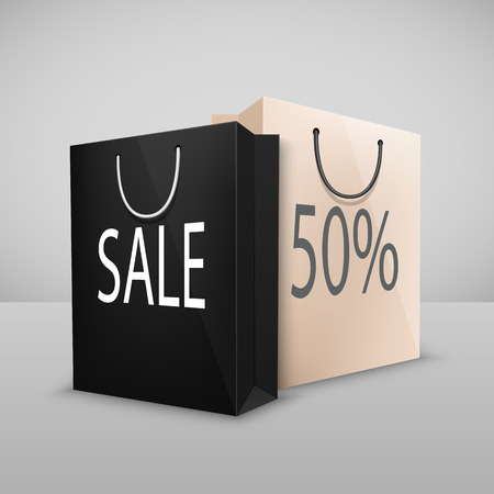 Black and white two shopping bags with written sale, isolated on whiteのイラスト素材