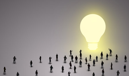 Large group of people stand in front of a glowing bulb sign. Concept of idea and creativity growth.のイラスト素材