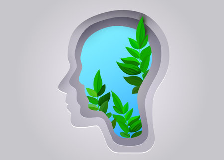 Silhouette of a human head with Tree leafs. Concept of mental health.のイラスト素材