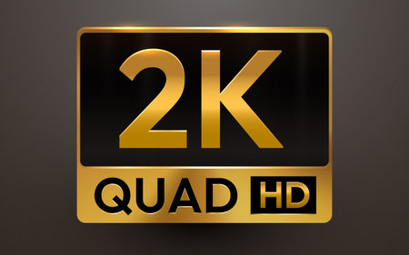 A sleek golden metallic 2K QUAD HD sign on a dark background, symbolizing high definition video standards.のイラスト素材