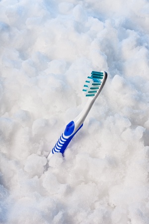 The Blue Toothbrush on snow.の写真素材