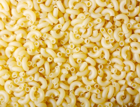 Yellow macaroni, vermicelli food backgroundの写真素材