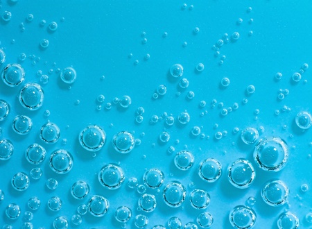 Blue abstract water with bubbles. Macro. Closeup. Horizontal.の写真素材