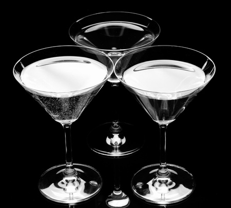 Silhouette of Three martini glass. Black and white graphic. Vintage photo.の写真素材