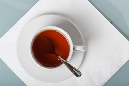 A cup of tea on a napkin  The geometric composition with copy space  の写真素材