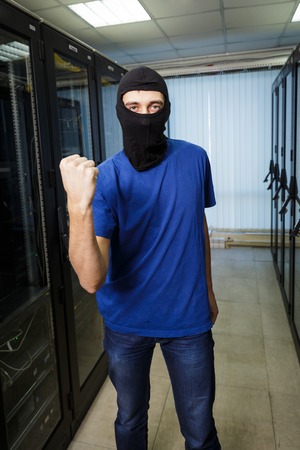 Masked cyber hacker