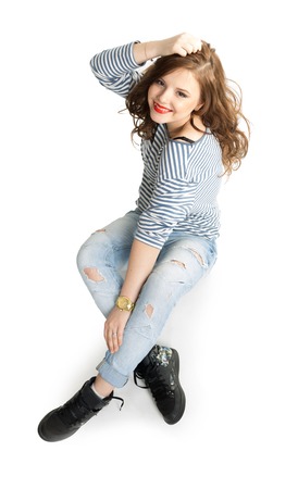 Girl in a striped vestの写真素材